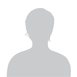 Silhouette of an unidentified person against a plain background.